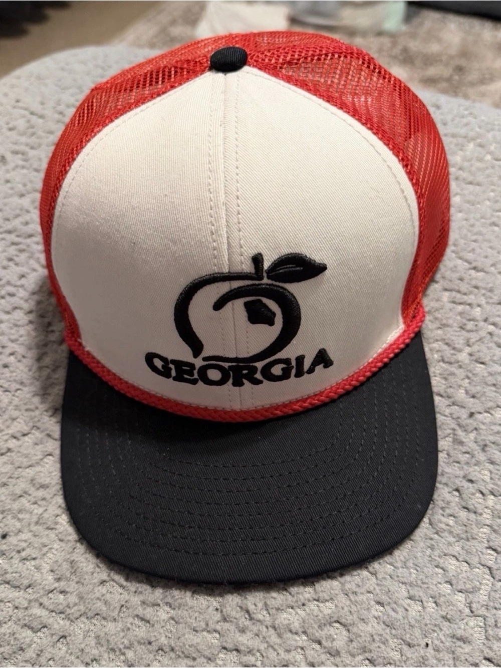 Georgia men’s Trucker Hat with Red Mesh and Black Brim